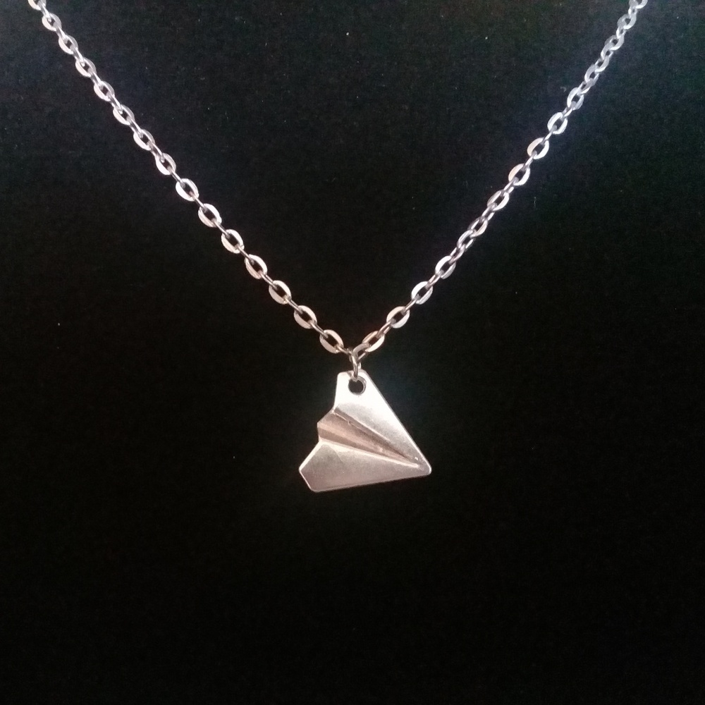 Silver paper airplane necklace